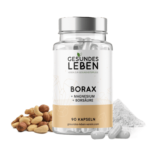 Product shot showing a bottle of Gesundes Leben Borax capsules with Magnesium and Boric Acid alongside a pile of mixed nuts and powder featuring a minimalist design with pale gold accents
